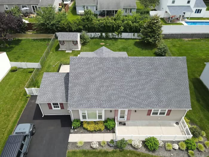 Aerial view of a residential roof at sunset